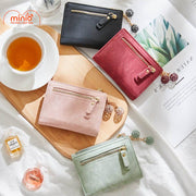 Ví kèm móc khoá quả cầu