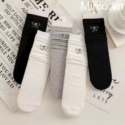 Vớ cổ cao nhún nơ