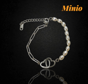 Lắc tay titan 040 ngọc trai mix tag tim