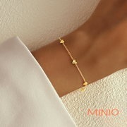 Lắc tay titan gold trái tim nổi