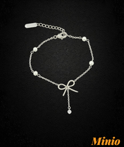 Lắc tay titan nơ thả đá 043