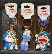 Móc khoá mica kute khoá vàng NB