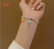 Lắc tay hạt cướm charm hoa cúc