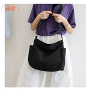 Túi đeo chéo canvas M50 TBL