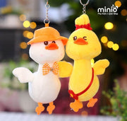 Móc khoá bông vịt vàng túi hoa