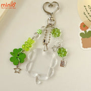 Móc khóa cỏ 4 lá treo hình