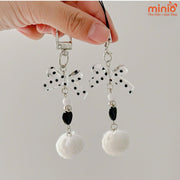 Móc khóa nơ chấm bi cục bông