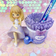 Ống cắm bút cô gái