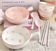 Thố tay cầm hoạ tiết nơ hồng