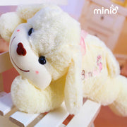 Chó nằm nơ lưng NB