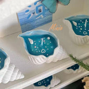 Nến thơm vỏ ốc NT