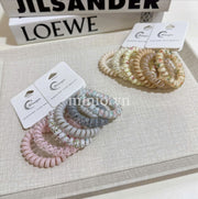 Set cột tóc lò xo màu hologram