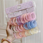 Set cột tóc lò xo màu hologram