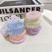 Set cột tóc lò xo màu hologram