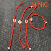 Vòng tay chỉ đỏ cẩm thạch cài nút bi