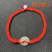 Vòng tay chỉ đỏ cẩm thạch cài nút bi