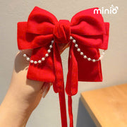 Kẹp tóc nơ đỏ dây ngọc BA