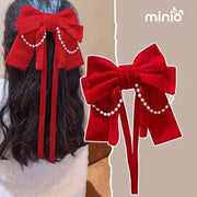 Kẹp tóc nơ đỏ dây ngọc BA