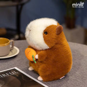 Chuột Hamster ôm cà rốt nhỡ
