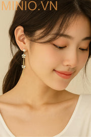 Bông tai nơ ngọc trai vàng xi 925 dài MH