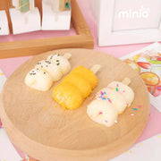 Bóp mochi xiên que