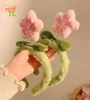 Cài tóc hoa đào hồng lò xo