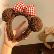 Cài tóc gấu xù đeo nơ