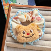 Scrunchies mặt thú viền pompom