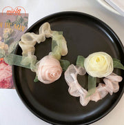 Cột tóc voan hoa hồng