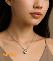 Dây chuyền titan nhẫn lồng đôi 055110MH