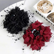 Kẹp càng cua 2 hoa ngọc tua rua