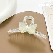 Kẹp càng cua nơ ngọc Vip