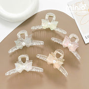 Kẹp càng cua nơ ngọc Vip