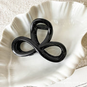 Kẹp càng cua nơ tròn