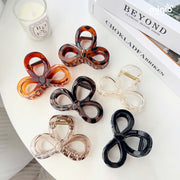 Kẹp càng cua nơ tròn