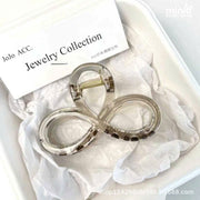 Kẹp càng cua nơ tròn