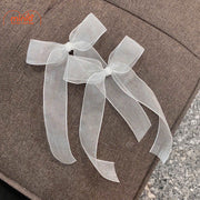 Kẹp mái nơ đen trắng PO