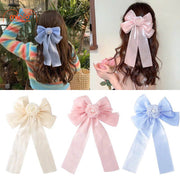 Kẹp tóc nơ hoa ngọc trai