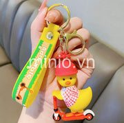 Móc khoá vịt đi xe