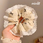 Scrunchies nơ chấm bi đen trắng