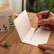 Thiệp vintage nền trắng lá xanh