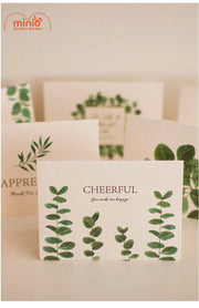 Thiệp vintage nền trắng lá xanh