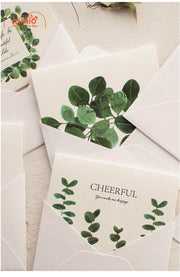 Thiệp vintage nền trắng lá xanh