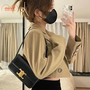 Túi xách Celine khoá vàng