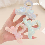 Kẹp càng cua nơ vân đá