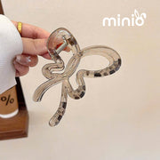 Kẹp càng cua bướm trong