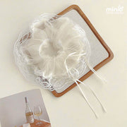 Scrunchies von ren đen trắng đính nơ ML