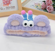 Băng đô 2 mắt tóc xoăn