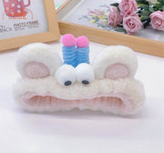 Băng đô 2 mắt tóc xoăn