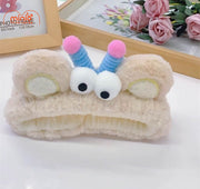 Băng đô 2 mắt tóc xoăn